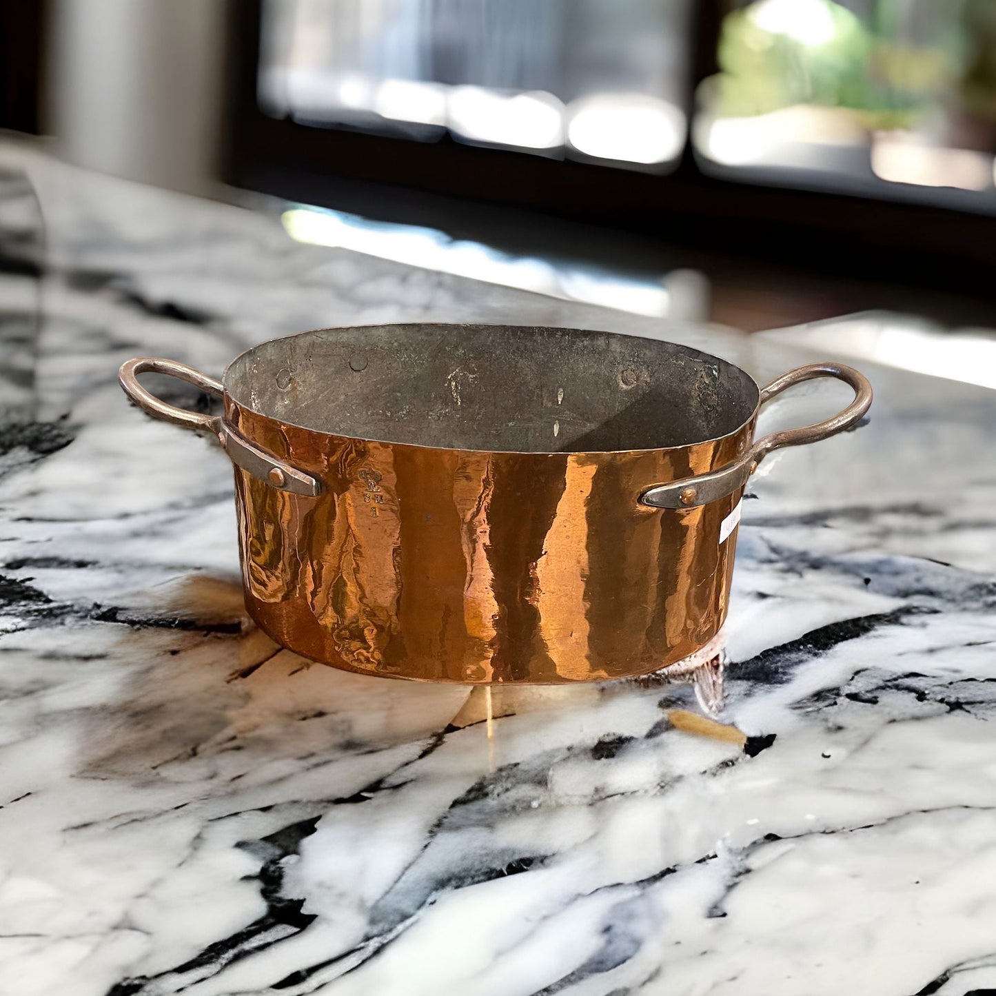 view in a marble kitchen of French Antique Large Oval Copper Cooking Pot