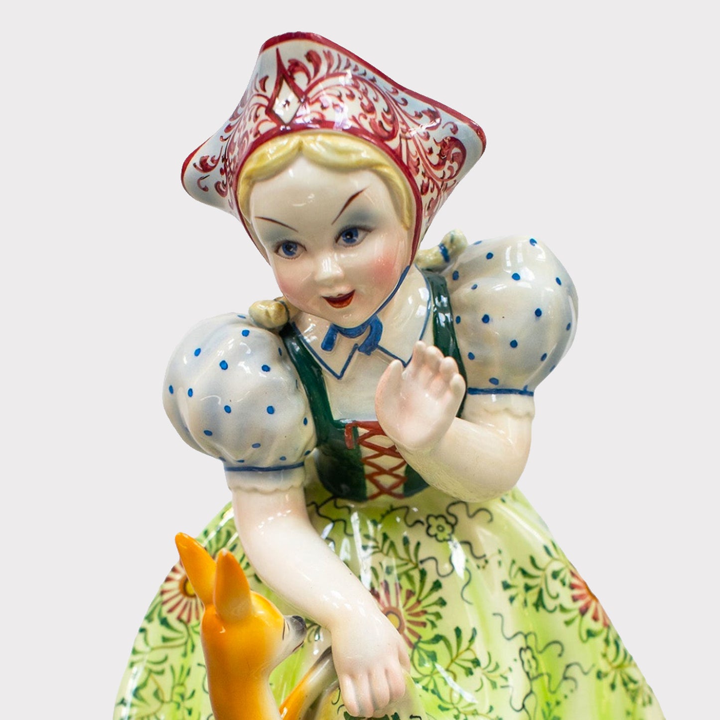 close up of Italian Porcelain Figurine Girl with Deer