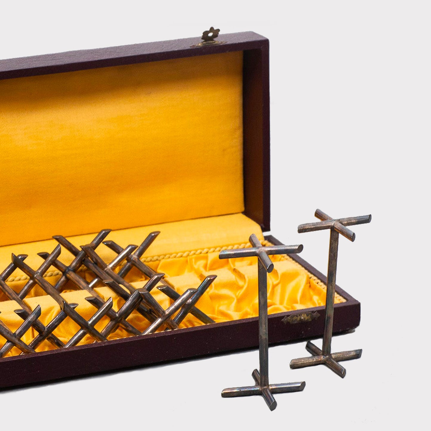 close up view of Silverplate Knife Holders in Antique Box