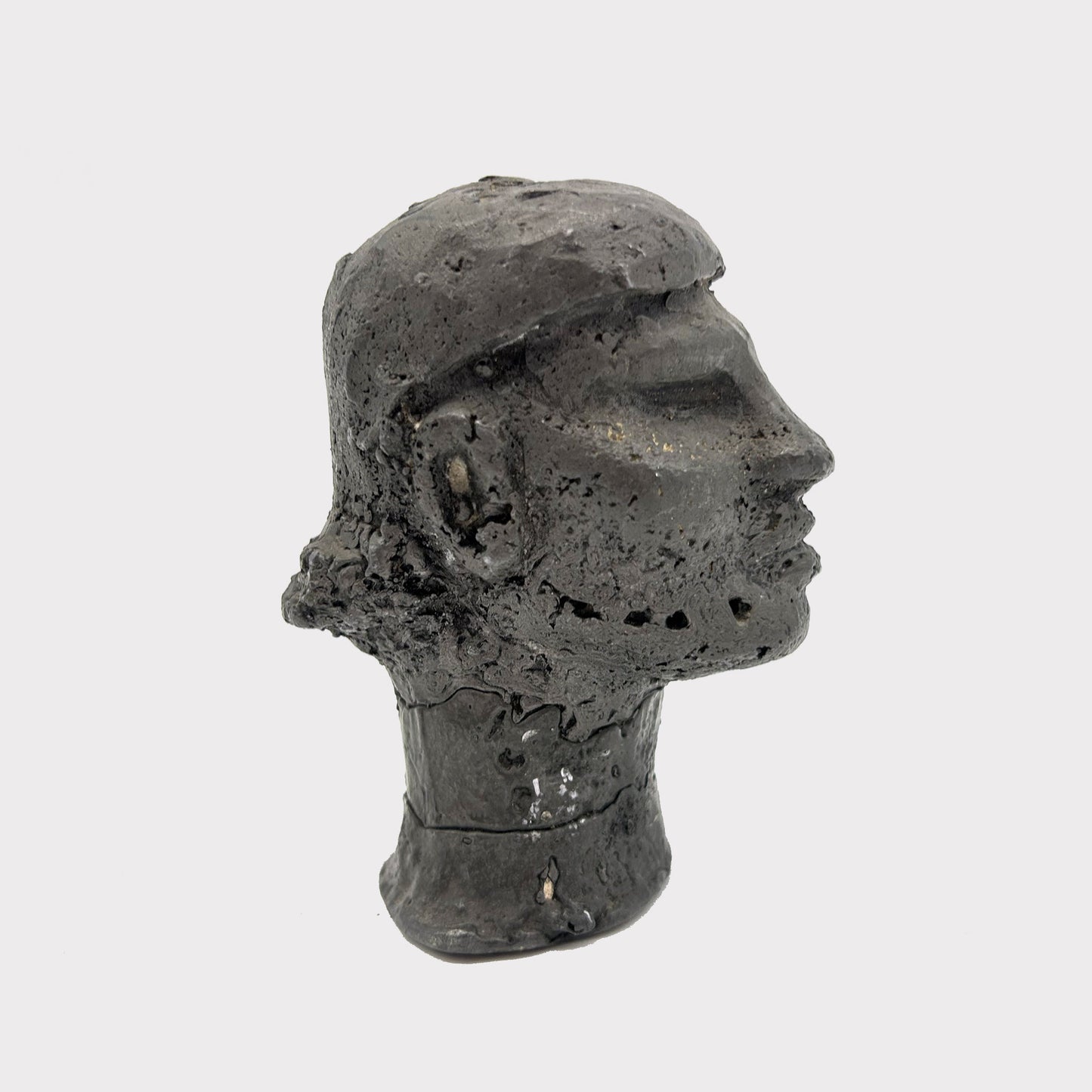side view of Small Bronze Head Statue from Africa