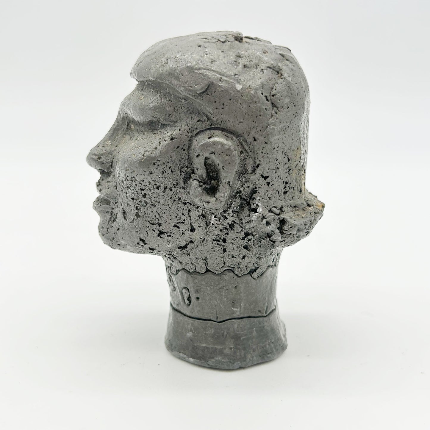 side view of Small Bronze Head Statue from Africa