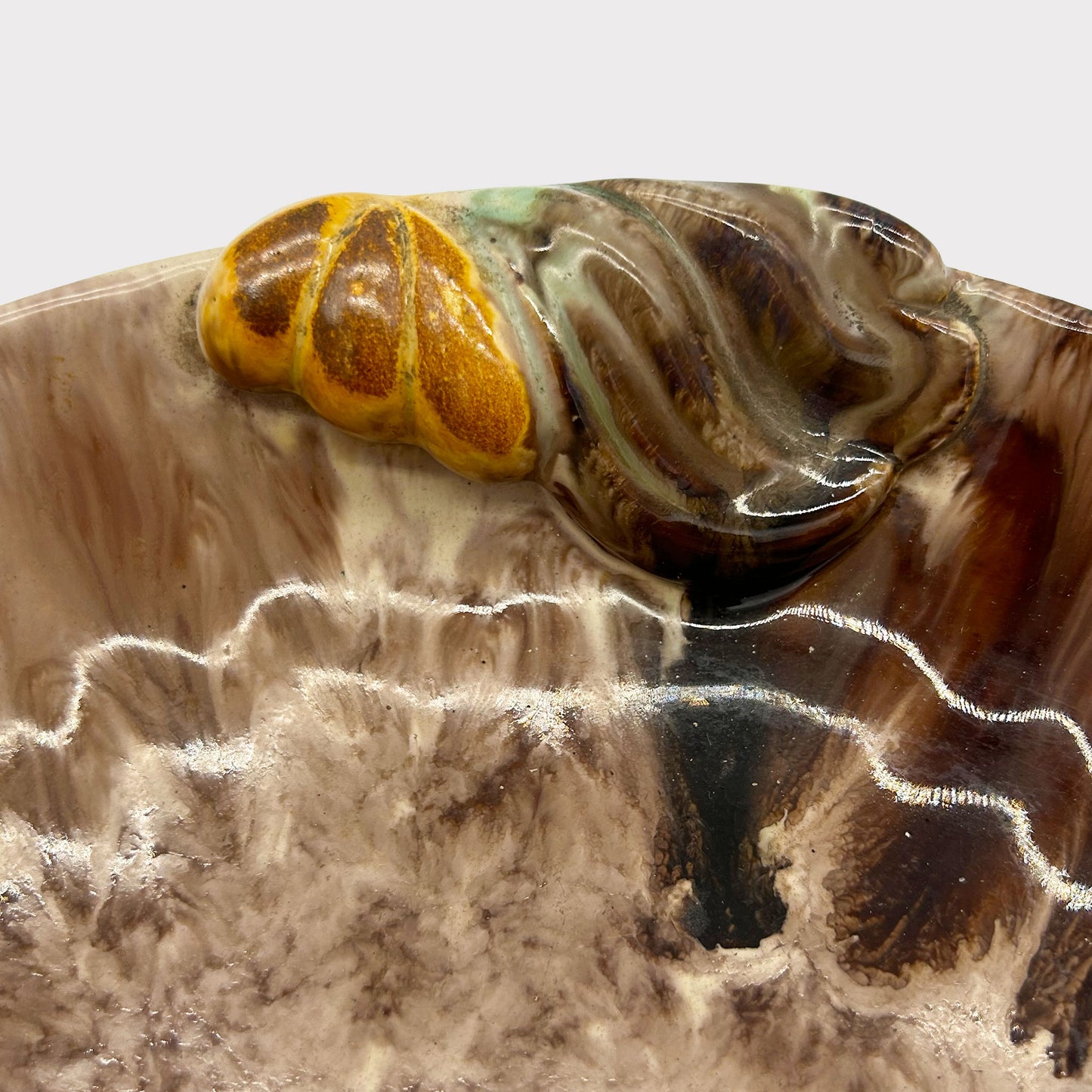 close up of edge detail of Brown & Cream colored glazed German pottery