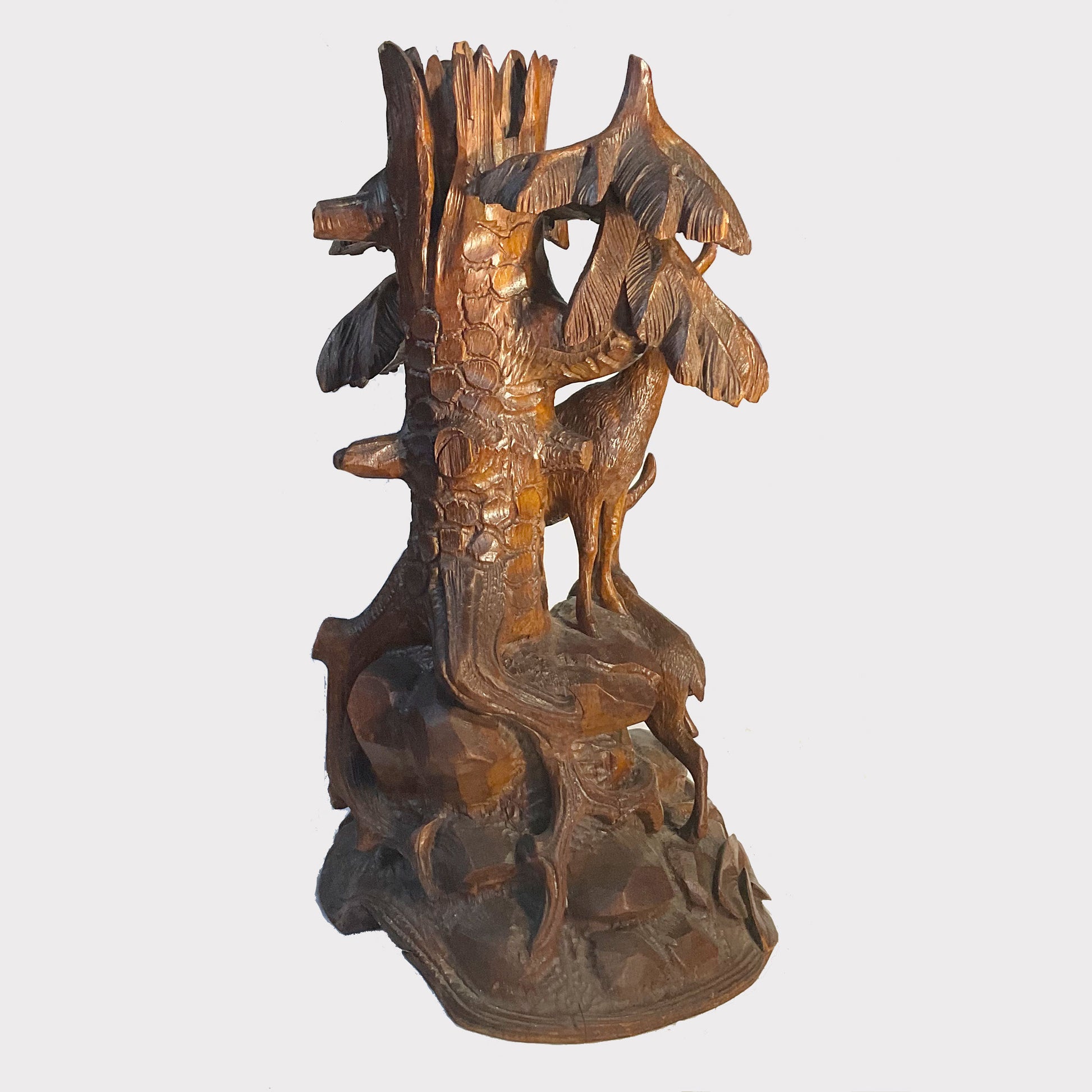 back view of a Black Forest Wooden Ibex Candleholder
