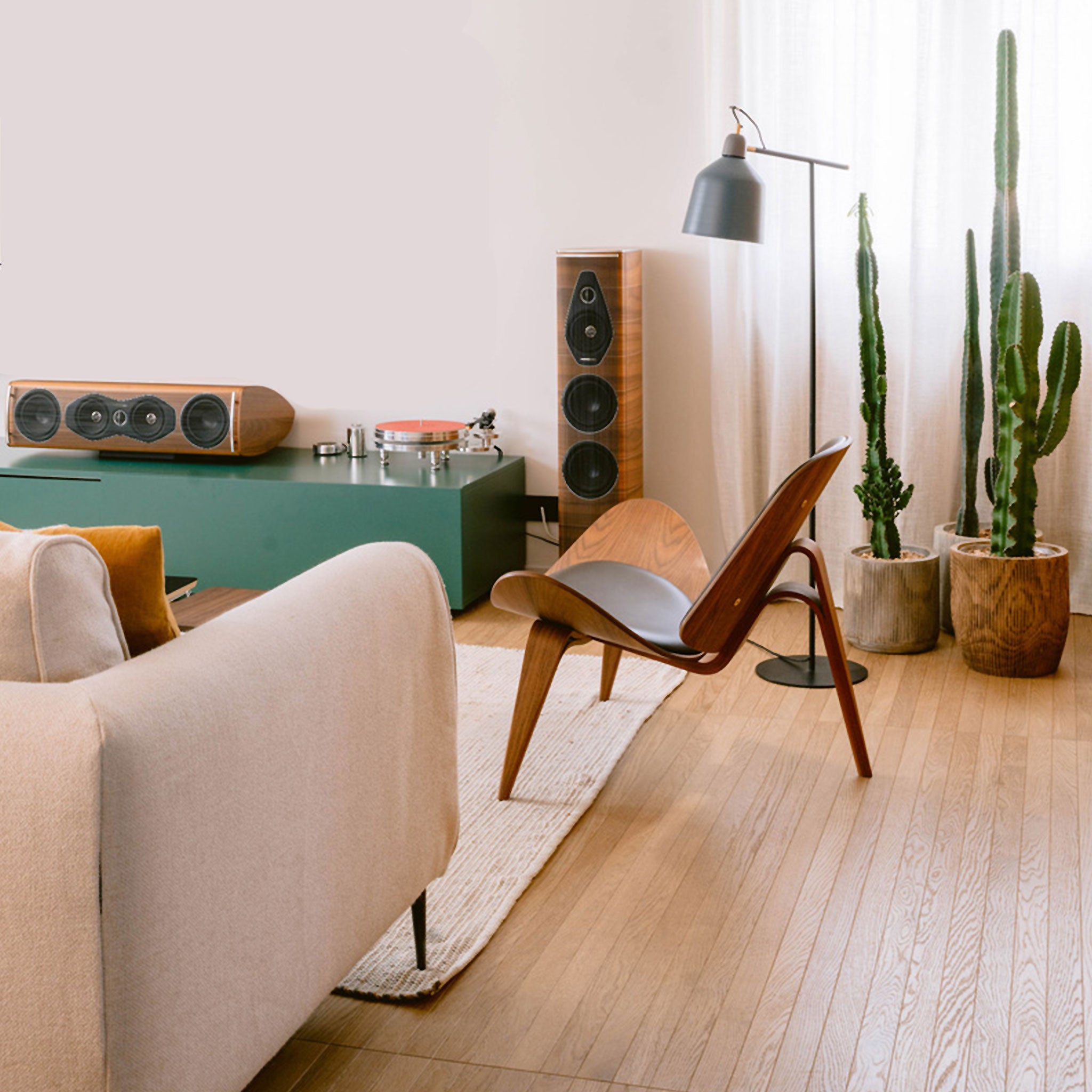 A mid-century design inspired living space featuring an iconic design chair as the focus.