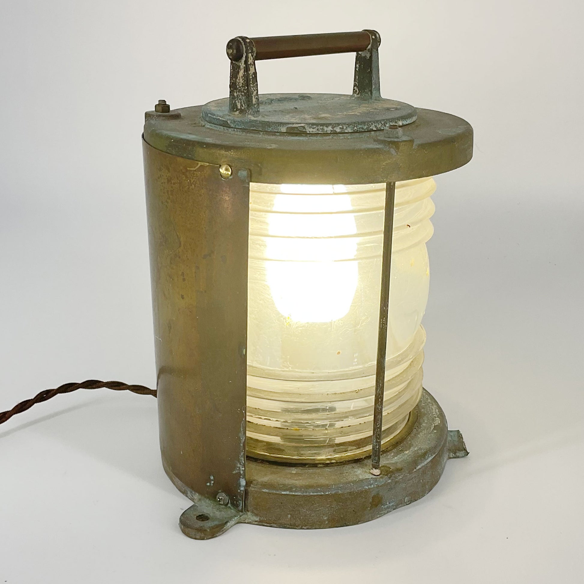 illuminated side view of Vintage Bronze Perko Maritime Lamp